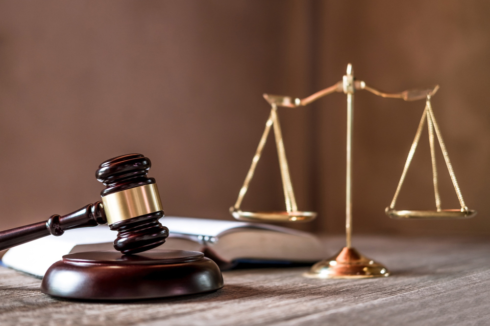 scales justice gavel wooden table agreement courtroom